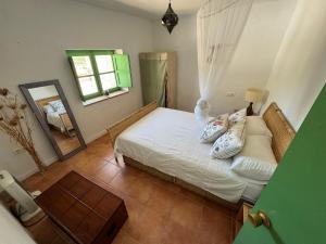 Postel nebo postele na pokoji v ubytování Casa León