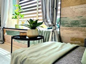 Posteľ alebo postele v izbe v ubytovaní Apartament Słoneczne Okno