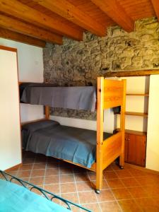 Postel nebo postele na pokoji v ubytování La casa sul fiume