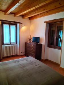 Postel nebo postele na pokoji v ubytování La casa sul fiume