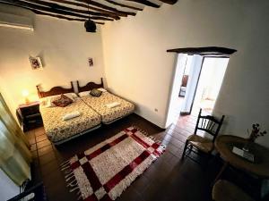 Postel nebo postele na pokoji v ubytování Casa Jazmin