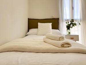 Postel nebo postele na pokoji v ubytování FuensalidaHomes101