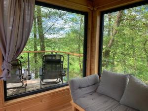 Balkón alebo terasa v ubytovaní Domek na drzewie w Dolinie Uradu