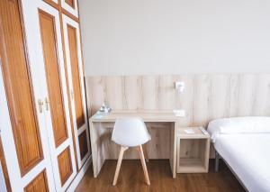 Cama o camas de una habitación en Hotel Alda Avenida