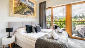 Posteľ alebo postele v izbe v ubytovaní Aparthotel Delta Boutique