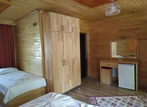 Postel nebo postele na pokoji v ubytování Olympos Yavuz Hotel
