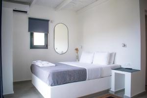 Vie rêvée luxury suites客房内的一张或多张床位