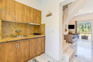 Cucina o angolo cottura di Doliva Studio Chris private pool