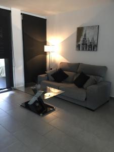 Posezení v ubytování Apartment OasisBeach La Zenia