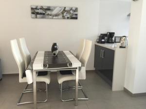 Kuchyň nebo kuchyňský kout v ubytování Apartment OasisBeach La Zenia