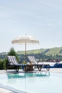 Bazén v ubytovaní Domki w Białce WOODHOUSE- basen, sauna, jacuzzi alebo v jeho blízkosti