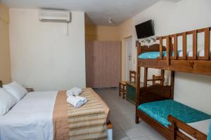 Posteľ alebo postele v izbe v ubytovaní Porto Skala Village Hotel