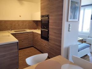 Kuchyň nebo kuchyňský kout v ubytování Appartement vue mer à 100 m de la plage