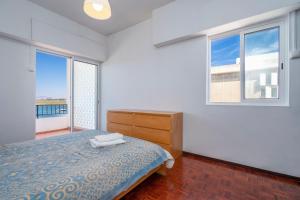 Postel nebo postele na pokoji v ubytování Sundance Beach House