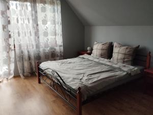 Łóżko lub łóżka w pokoju w obiekcie ABM Noclegi