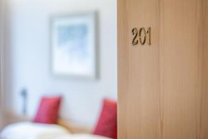 Ένα ή περισσότερα κρεβάτια σε δωμάτιο στο Hotel Vorab - Kulinarische Vielfalt