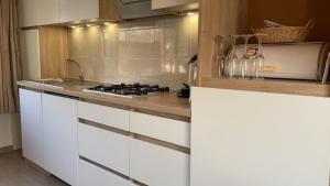 Η κουζίνα ή μικρή κουζίνα στο Chalet met veel buiten ruimte