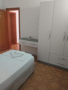 Postel nebo postele na pokoji v ubytování Hotel Ani