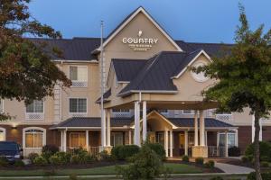 eine Darstellung der Vorderseite eines Hotels in der Unterkunft Country Inn & Suites by Radisson, Madison, AL in Madison