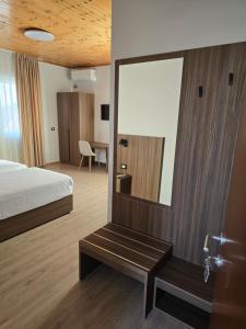 Postel nebo postele na pokoji v ubytování Hotel Aleks