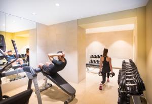 a group of people exercising in a gym at Hotel Kvarner - Liburnia in Opatija