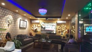 Χώρος καθιστικού στο CHETAN INN HOTEL