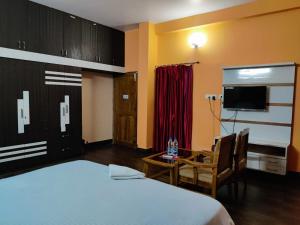 Μια τηλεόραση ή/και κέντρο ψυχαγωγίας στο CHETAN INN HOTEL