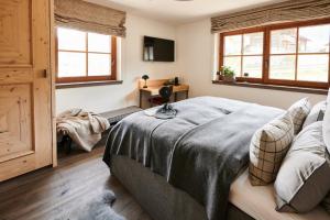 Postel nebo postele na pokoji v ubytování Premium B&B Chalet Evi