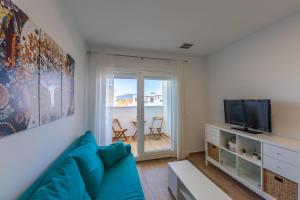 TV a/nebo společenská místnost v ubytování Luz de Alborada by Inmo360Solutions