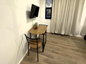 TV a/nebo společenská místnost v ubytování Day Dream L23 Guesthouse