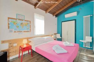 Postel nebo postele na pokoji v ubytování A Casa Tua Room, Terre Marine