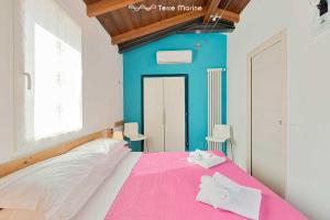 Postel nebo postele na pokoji v ubytování A Casa Tua Room, Terre Marine