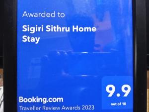 Certificato, attestato, insegna o altro documento esposto da Sigiri Sithru Home Stay