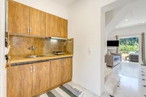 Cucina o angolo cottura di Doliva Studio John private jacuzzi