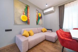 Χώρος καθιστικού στο Central apartment with a swimming pool