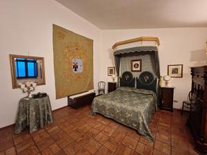Postel nebo postele na pokoji v ubytování Convento Dei Riformati