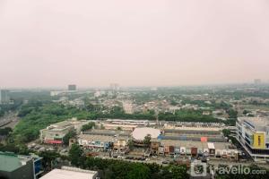 an aerial view of a city with buildings at Stunning Studio Transpark Bintaro Apartment By Travelio in Tangerang +7 photos