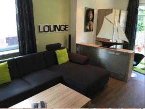 Posezení v ubytování Ferienwohnung LOFT- direkt am Falderndelft - nähe Innenstadt