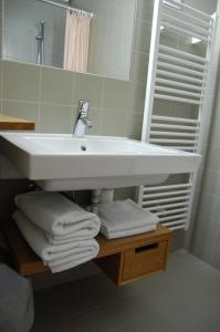 Koupelna v ubytování Hotel Rakar