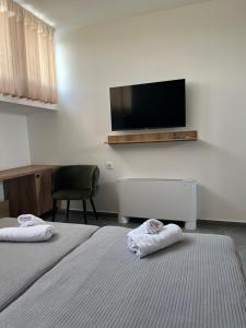 Postel nebo postele na pokoji v ubytování PROTERM apartments