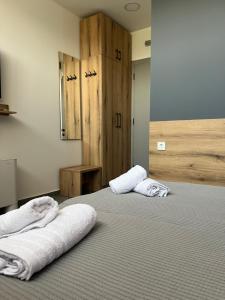 Postel nebo postele na pokoji v ubytování PROTERM apartments