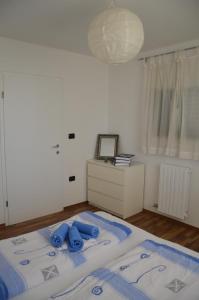 Postel nebo postele na pokoji v ubytování Apartments Bertok