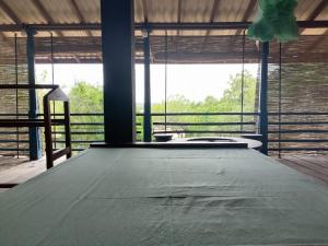 Postel nebo postele na pokoji v ubytování Cozye Yala Hostel + 18 fotografií