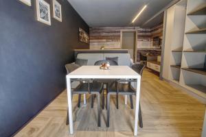 Posteľ alebo postele v izbe v ubytovaní Sui Generis - Aosta Urban Apartments