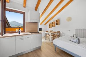 A bed or beds in a room at Residence Lagorai