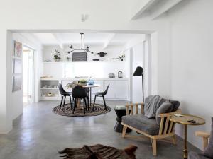 a living room with a table and chairs at The Cottage Collection Paternoster in Paternoster
