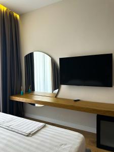 TV a/nebo společenská místnost v ubytování Oniro by Iliria Palace + 34 fotografií