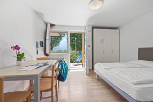 A bed or beds in a room at Residence Lagorai