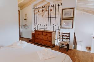 Postel nebo postele na pokoji v ubytování Relais de Charme le Videlle
