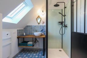 Koupelna v ubytování Maison de vacances Kerkohann + 18 fotografií